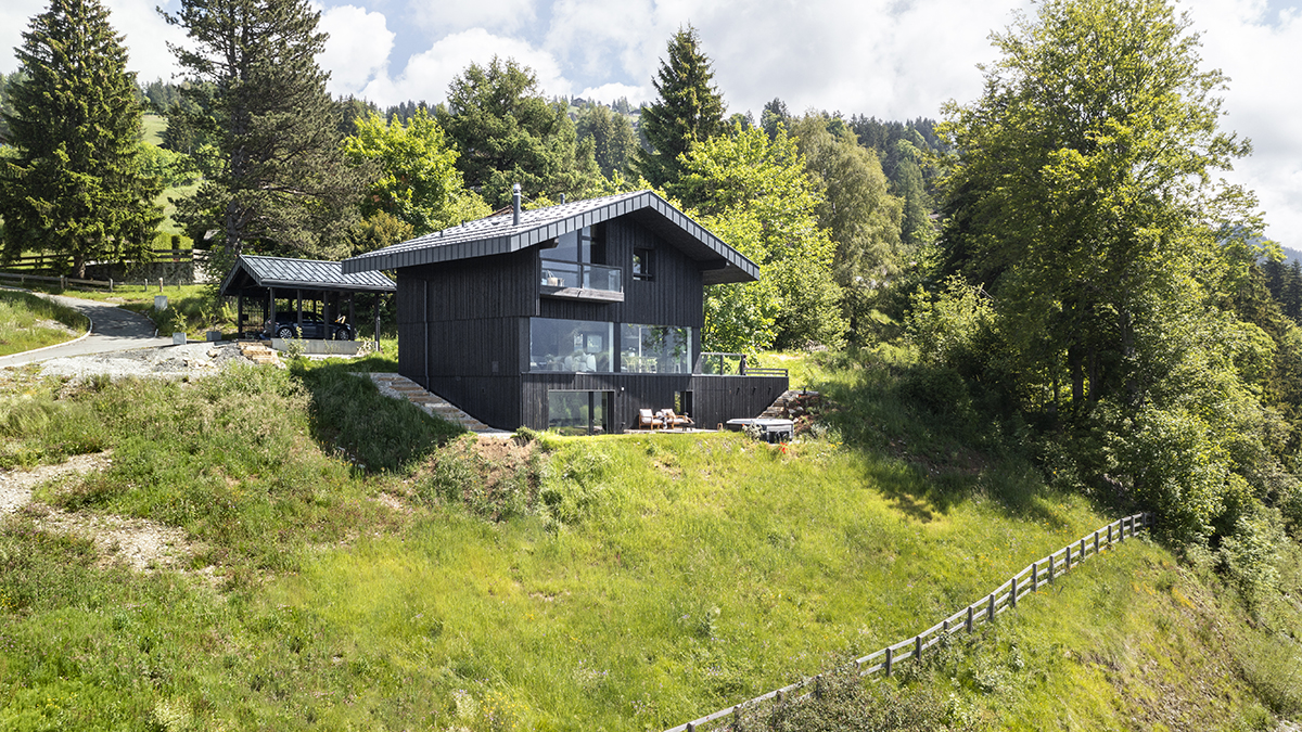 This Mountaintop Home in Switzerland Is a Modern Take on a Classic Alpine Chalet