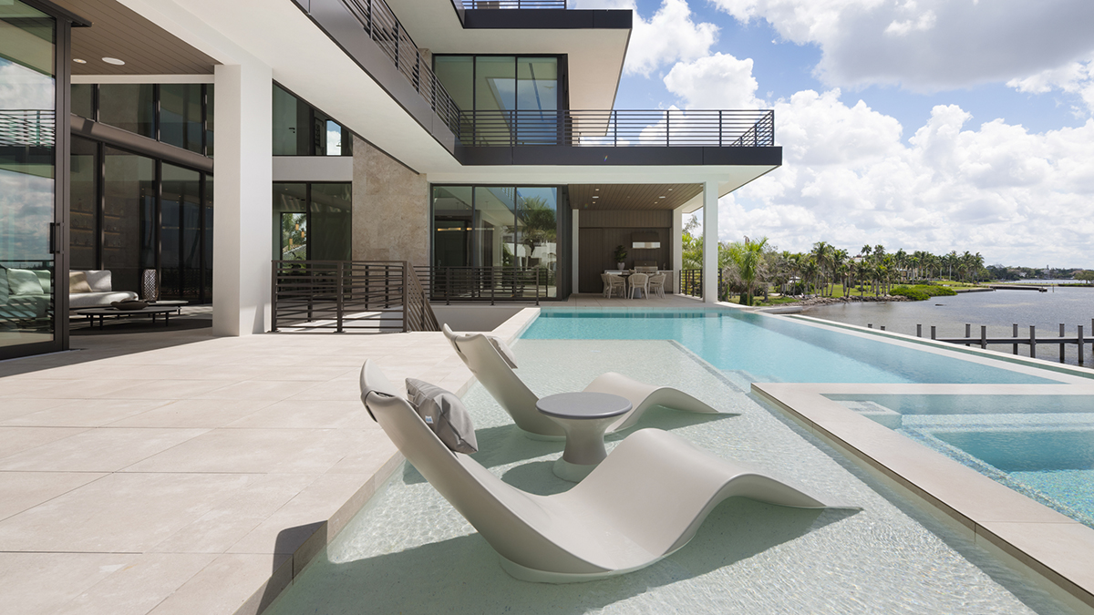 This $19 Million Sarasota Abode Has a 10-Car Garage on the Bottom and a Putting Green on Top